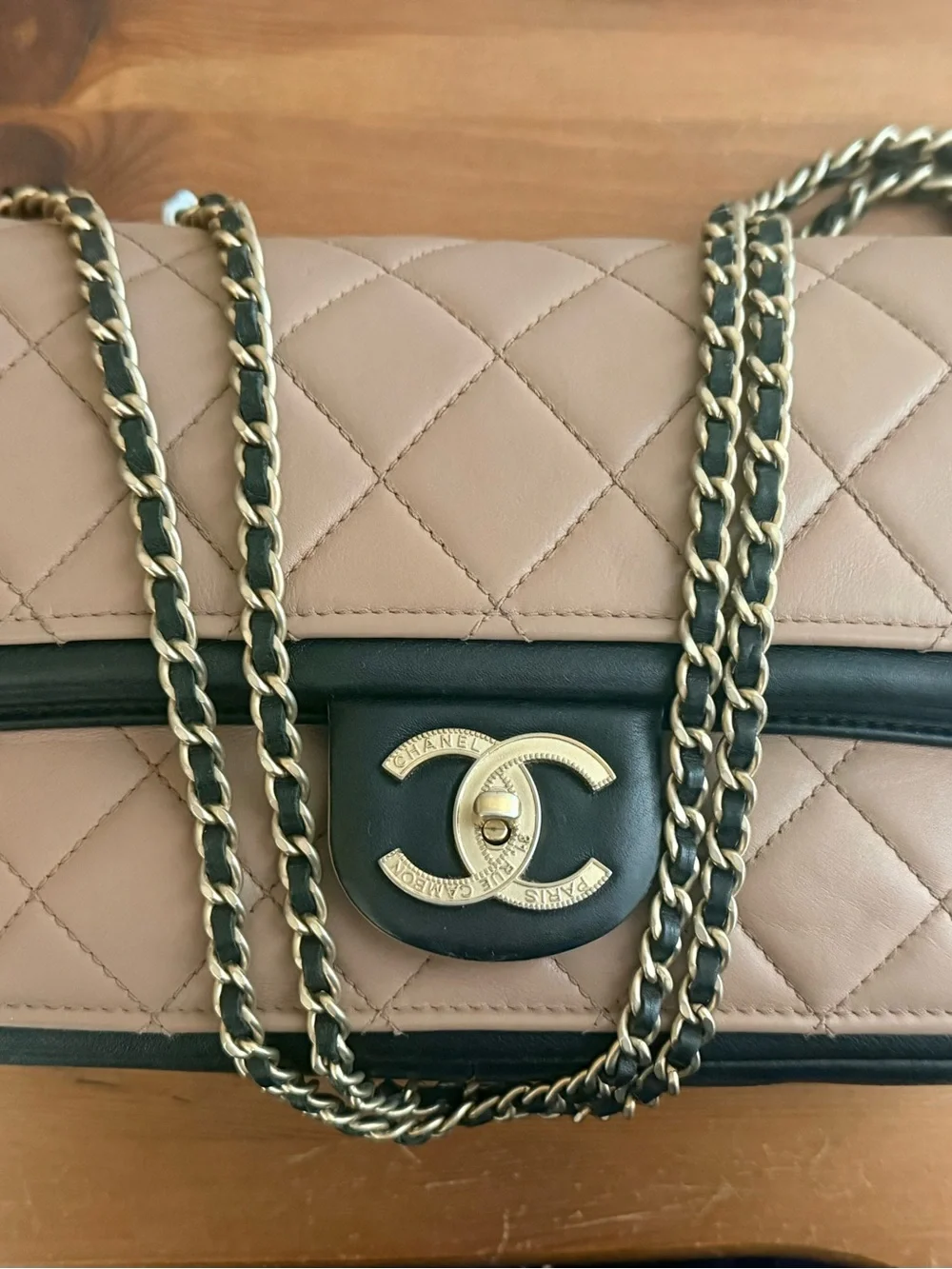 Authentic Chanel Quilted Flap Shoulder Bag - Beige with Black Trim